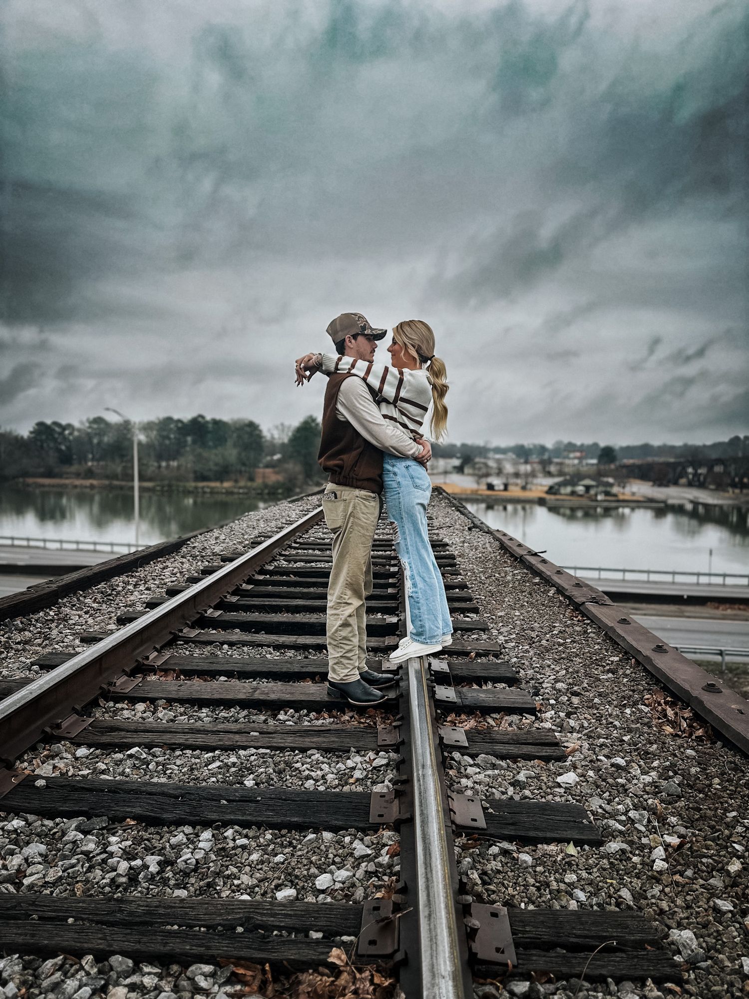 Couple embracing in natural light