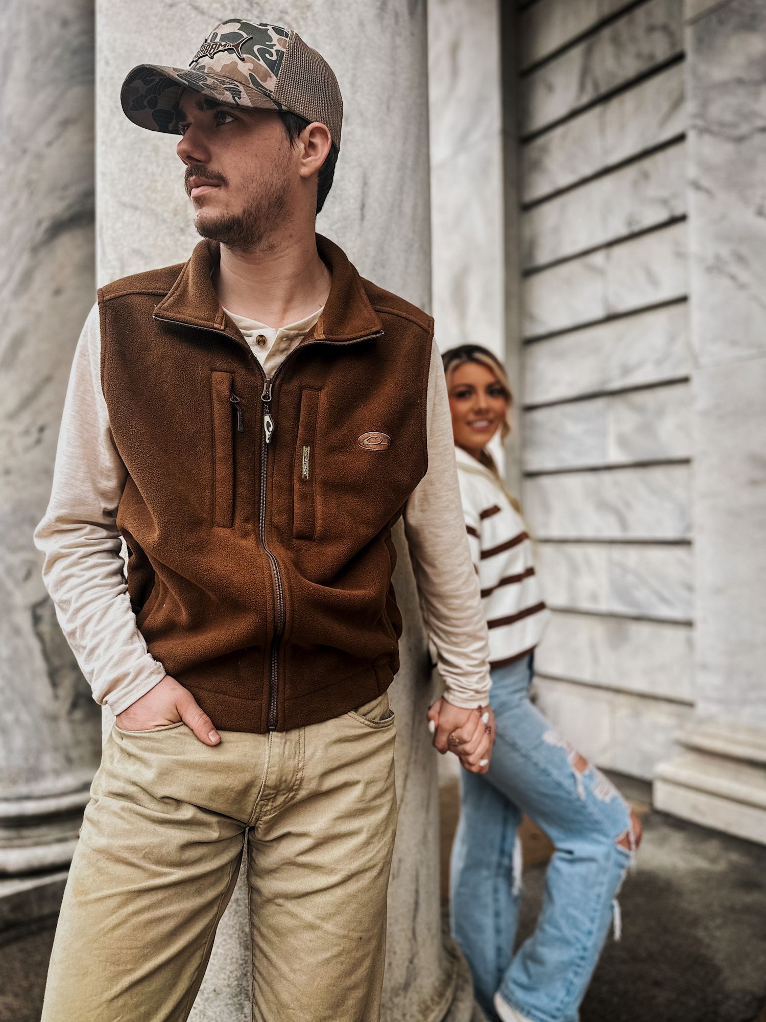 Artistic couple portrait with dramatic lighting