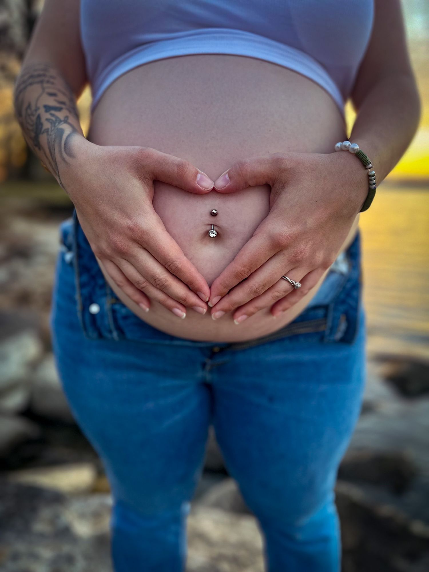 Silhouette maternity portrait at dusk