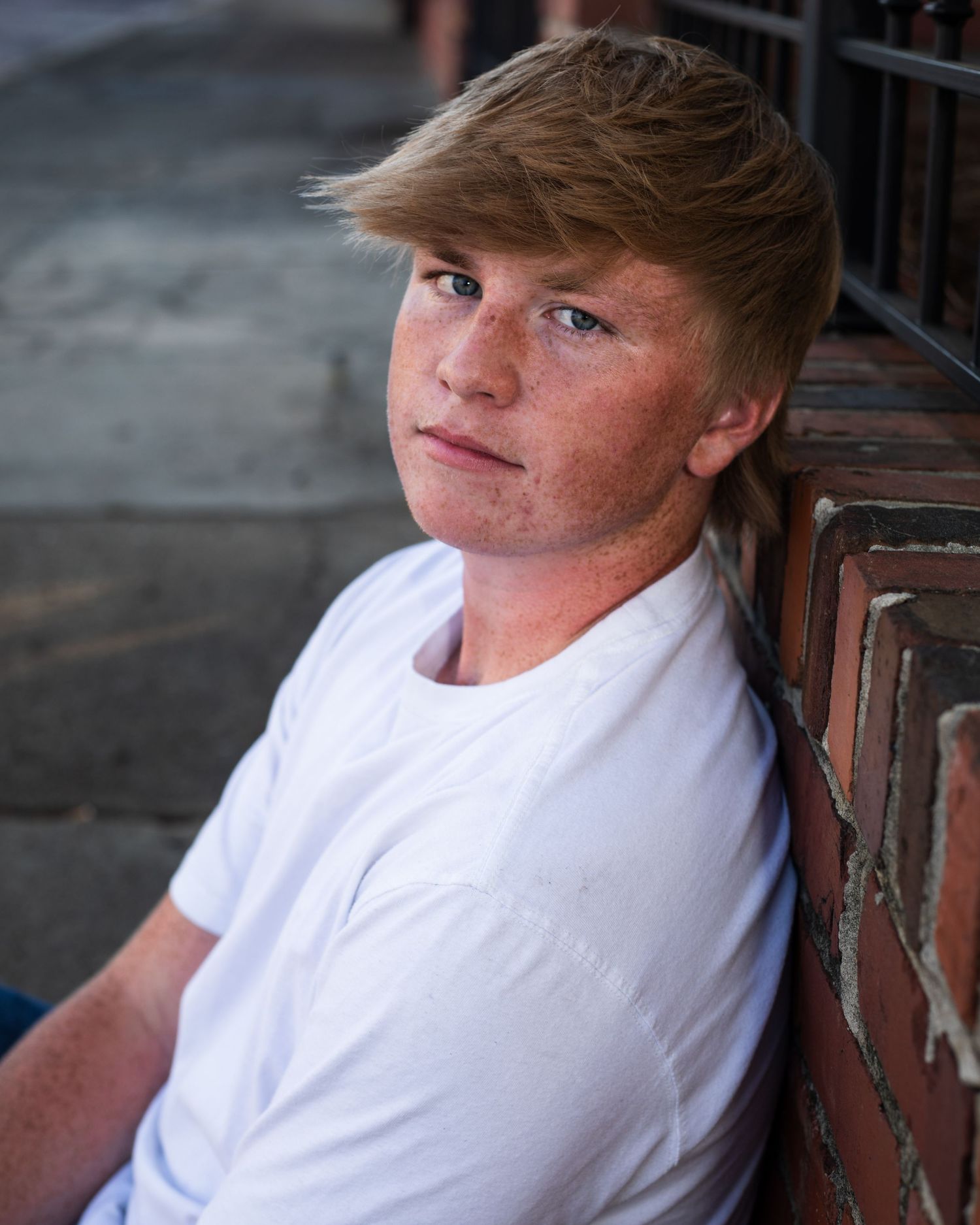 Senior portrait with sunset backdrop